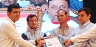 District Nursing Officer Sunil Sen honored at state level function